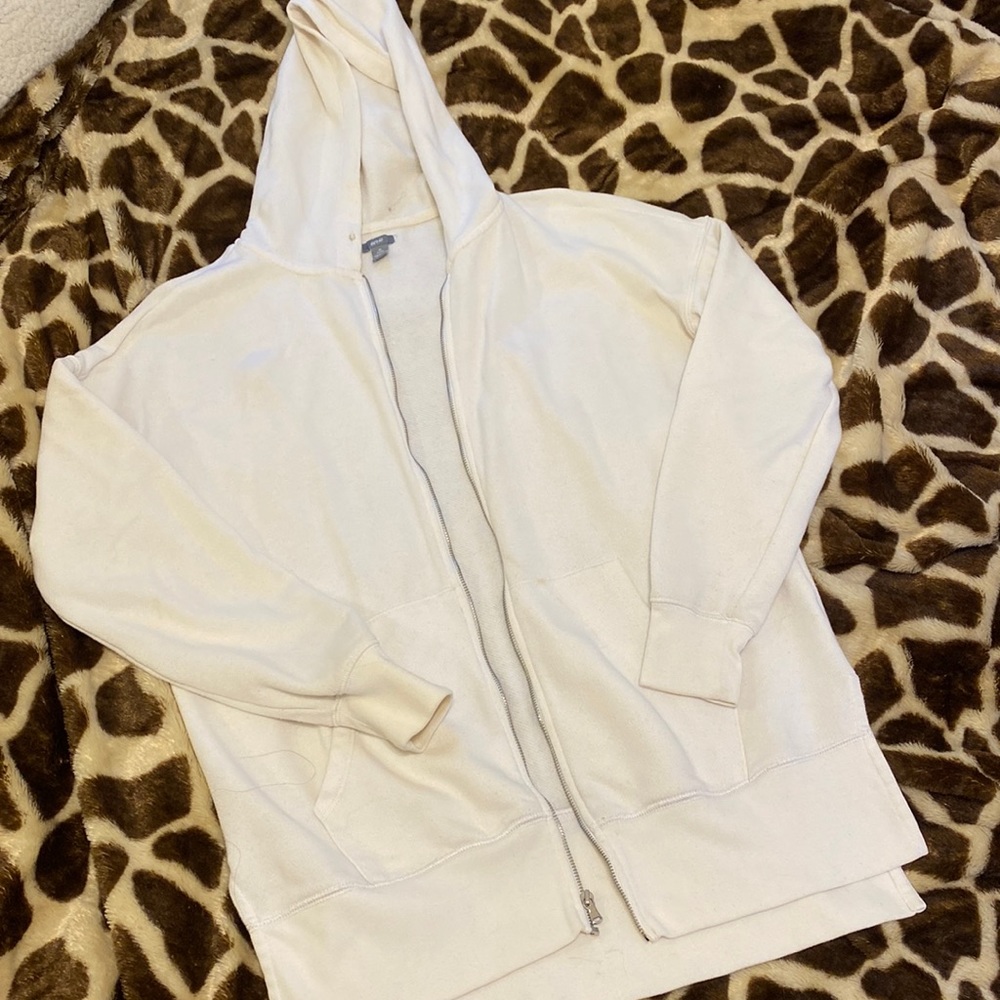 Long, white hoodie.